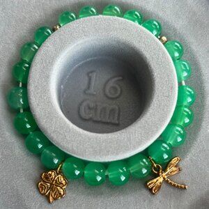 Handmade Green Beaded Elastic Bracelet with Clover and Firefly Charm